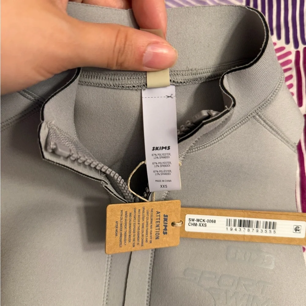 Skims Size xxs Sport Swim Mock Neck Zip Top Chrome Gray Sleeveless Zip Front NWT